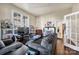 Comfortable living room with cozy seating, a fireplace, and shelving, perfect for relaxing or entertaining guests at 121 York St, Chester, SC 29706