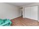 Bare bedroom with clean interior, featuring a closet and hardwood floors at 1323 Queens Rd # 308, Charlotte, NC 28207