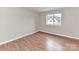 Bedroom with a chair, neutral color and hardwood floors at 1323 Queens Rd # 308, Charlotte, NC 28207