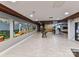 Spacious lobby featuring artwork, modern lighting, tile floors, and a common kitchenette at 1323 Queens Rd # 308, Charlotte, NC 28207