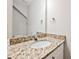 Bathroom features a granite countertop and a modern sink at 1412 Meadow Ave, Kannapolis, NC 28083