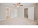 Bright bedroom with natural light, new carpet, and attached bathroom at 1412 Meadow Ave, Kannapolis, NC 28083