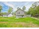 Exterior view of the back of the property with a spacious backyard at 1412 Meadow Ave, Kannapolis, NC 28083