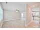 Spacious living room with light wood floors and fresh, neutral paint, creating a welcoming atmosphere at 1412 Meadow Ave, Kannapolis, NC 28083