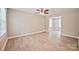 The living room features light-toned walls, wood-look floors, and a ceiling fan at 1412 Meadow Ave, Kannapolis, NC 28083