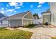 Beautiful backyard with a patio, green lawn, and privacy fence at 14462 Holly Springs Dr, Huntersville, NC 28078