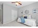 Cozy bedroom with a large window and ample closet space at 14462 Holly Springs Dr, Huntersville, NC 28078