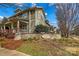 Charming Monteith Park community entrance featuring craftsman-style architecture and lush landscaping at 14462 Holly Springs Dr, Huntersville, NC 28078