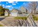 Beautiful two-story home with an attached garage and well-kept lawn at 14462 Holly Springs Dr, Huntersville, NC 28078
