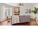 Inviting living room with a stone fireplace, hardwood floors, and neutral decor at 14462 Holly Springs Dr, Huntersville, NC 28078