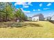 Spacious backyard with a playset, and expansive lawn, perfect for outdoor activities at 146 Allenton Way, Statesville, NC 28677