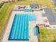 Overhead view of a community pool with a large pool, playground, and picnic area at 146 Allenton Way, Statesville, NC 28677