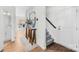 Bright foyer features hardwood floors and stylish decor, creating a welcoming entrance at 146 Allenton Way, Statesville, NC 28677