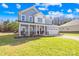 Charming two-story home with a welcoming front porch and beautiful landscaping at 146 Allenton Way, Statesville, NC 28677