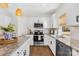Modern kitchen with stainless steel appliances, granite countertops, and ample cabinet space at 146 Allenton Way, Statesville, NC 28677