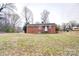 Home sits on a large lot at 154 Bingham Dr, Charlotte, NC 28213