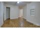 Bedroom features hardwood floors, closet, and shelf at 154 Bingham Dr, Charlotte, NC 28213