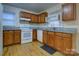 An eat-in kitchen with wood cabinets and stainless steel appliances at 154 Bingham Dr, Charlotte, NC 28213