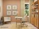 Bright home office with desk, chair, natural light, and built-in storage at 1566 Croydon St, Indian Land, SC 29707