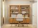 Stylish home office featuring a modern desk, shelving, and an inviting workspace, perfect for productivity and comfort at 1566 Croydon St, Indian Land, SC 29707