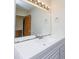Bathroom vanity featuring a clean white sink, countertop, and large mirror with decorative lighting at 1825 Hyatt Ave, Rock Hill, SC 29732