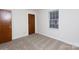 Clean bedroom features neutral walls, carpeting, and a window at 1825 Hyatt Ave, Rock Hill, SC 29732