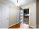 Inviting entryway showcasing hardwood floors and a glimpse of the exterior through an open front door at 1825 Hyatt Ave, Rock Hill, SC 29732