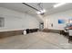 Spacious garage with ample storage space, a water heater, and access to the interior of the home at 2014 Bryant Park Dr, Charlotte, NC 28208