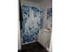 Small bathroom featuring a shower with a floral curtain at 2204 W Second Ave, Gastonia, NC 28052