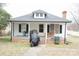 Charming single-story home with a cozy front porch and a well-maintained brick foundation at 2204 W Second Ave, Gastonia, NC 28052