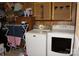 Practical laundry area featuring modern washer and dryer units, plus extra storage space at 2204 W Second Ave, Gastonia, NC 28052