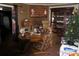 Cozy living room featuring a fireplace, hardwood floors, and vintage furniture at 2204 W Second Ave, Gastonia, NC 28052