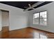 Bright bedroom with stained concrete floors, ceiling fan, and large windows at 2338 Yadkin Ave # 205, Charlotte, NC 28205