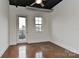 Well-lit bedroom with a door to a balcony and window, creating a relaxing retreat at 2338 Yadkin Ave # 205, Charlotte, NC 28205