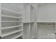 Spacious walk-in closet with ample shelving and hanging space for clothing and accessories at 2338 Yadkin Ave # 205, Charlotte, NC 28205