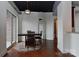 Cozy dining area with stained concrete floors and adjacent balcony access at 2338 Yadkin Ave # 205, Charlotte, NC 28205
