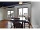 Inviting dining room features large windows, modern lighting, and sleek furniture at 2338 Yadkin Ave # 205, Charlotte, NC 28205