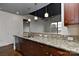 Modern kitchen featuring stainless steel appliances, granite countertops, and pendant lighting at 2338 Yadkin Ave # 205, Charlotte, NC 28205