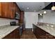 Spacious kitchen with granite countertops and stainless steel appliances, perfect for cooking at 2338 Yadkin Ave # 205, Charlotte, NC 28205