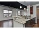 Modern kitchen featuring granite countertops and stainless steel appliances at 2338 Yadkin Ave # 205, Charlotte, NC 28205
