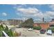 A view overlooking a parking lot with a mix of cars and green spaces, showcasing community amenities at 2338 Yadkin Ave # 205, Charlotte, NC 28205