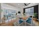 Bright dining room with a table set for six, and open to the living room at 261 Helton Ln, Fort Mill, SC 29708