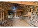 Attic space with exposed beams, wood flooring, and equipment at 2845 Wood Gate Rd, Lincolnton, NC 28092