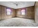 Spacious bedroom with a ceiling fan, unique ceiling design, and bright natural light at 2845 Wood Gate Rd, Lincolnton, NC 28092