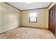 Bedroom featuring neutral-toned walls, plush carpeting, and a closet for ample storage at 2845 Wood Gate Rd, Lincolnton, NC 28092