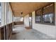 Screened porch with a swing and neutral colors; great for outdoor relaxation at 2845 Wood Gate Rd, Lincolnton, NC 28092