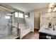 Modern bathroom features a glass-enclosed shower, a soaking tub, double sinks, and elegant marble accents at 3542 Rapport Ct # 37, Lancaster, SC 29720
