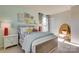Bright bedroom with cheerful decor, a cozy bed, and a unique accent chair at 3542 Rapport Ct # 37, Lancaster, SC 29720