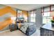 Stylish bedroom featuring playful decor, gray walls, orange accents, and ample natural light from the windows at 3542 Rapport Ct # 37, Lancaster, SC 29720
