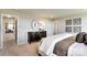 Cozy bedroom with neutral tones, a comfortable bed, a dresser with a round mirror, and easy access to other rooms at 3542 Rapport Ct # 37, Lancaster, SC 29720